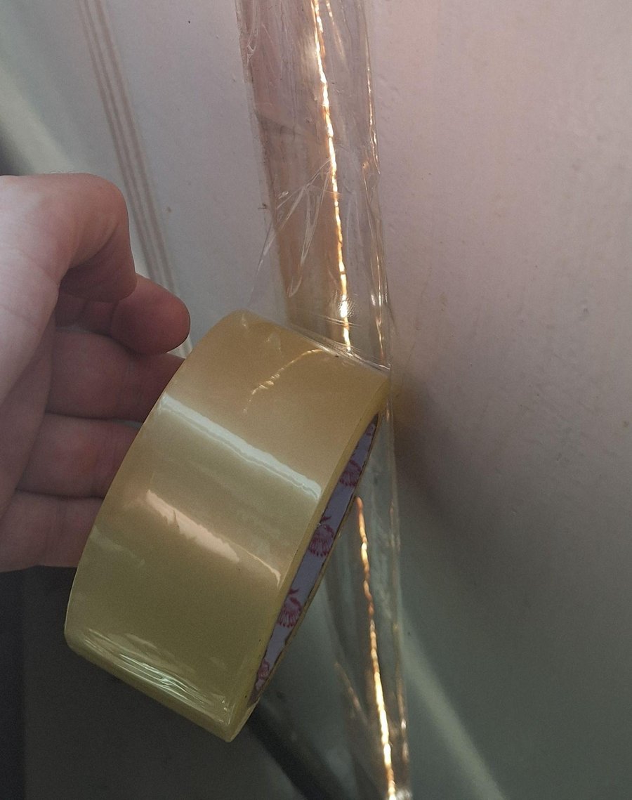 Sealing window gap with tape